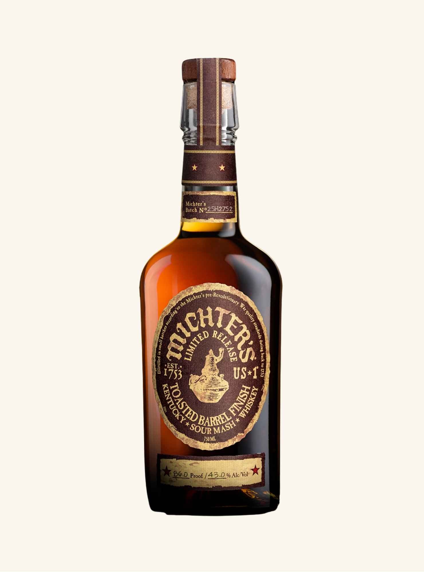 Bottle of Michter's US* toasted barrel finish sour mash whiskey on a white background