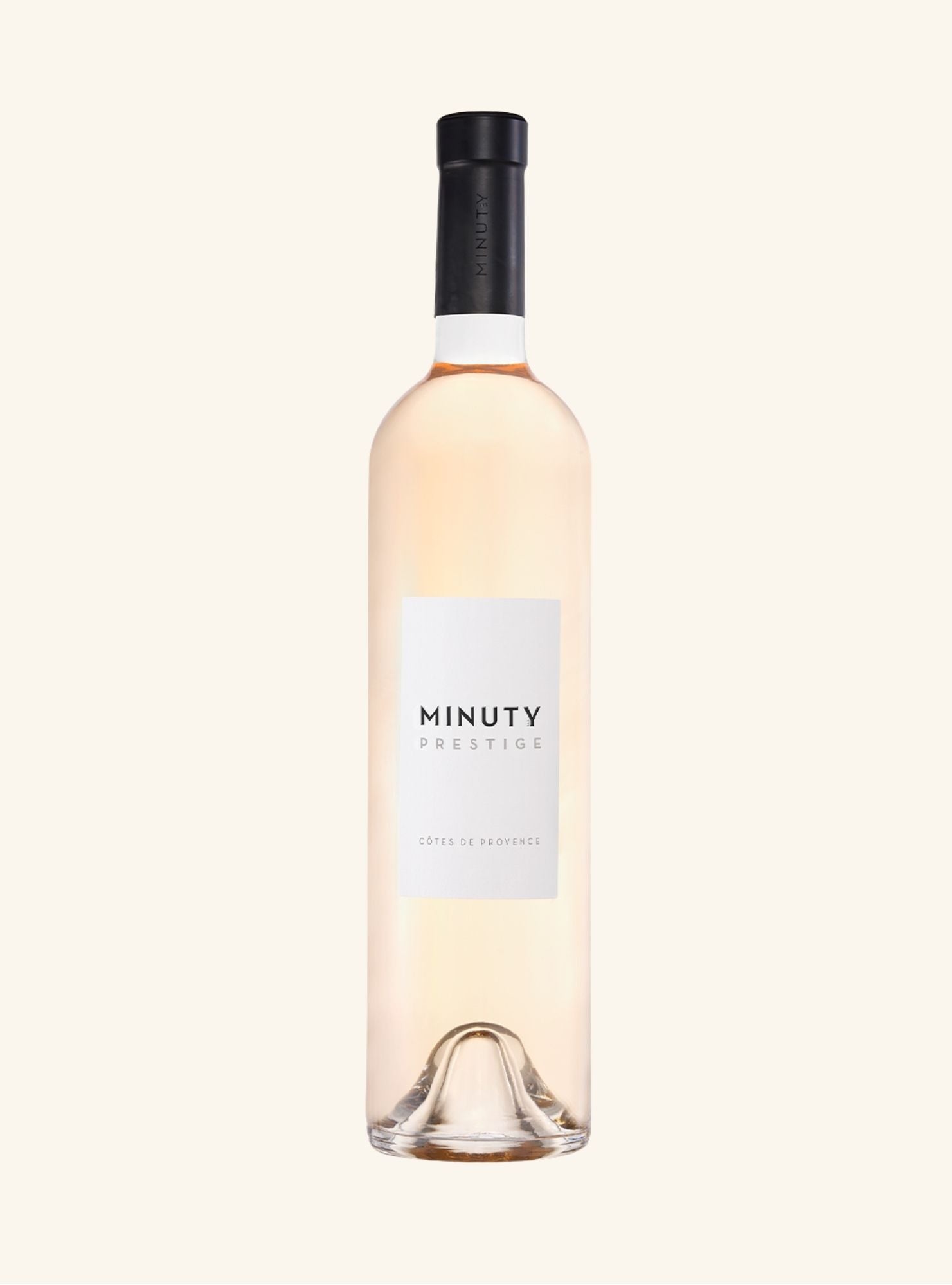 Rose Wine bottle labeled 'Minuty Prestige cotes de Provence on a white background