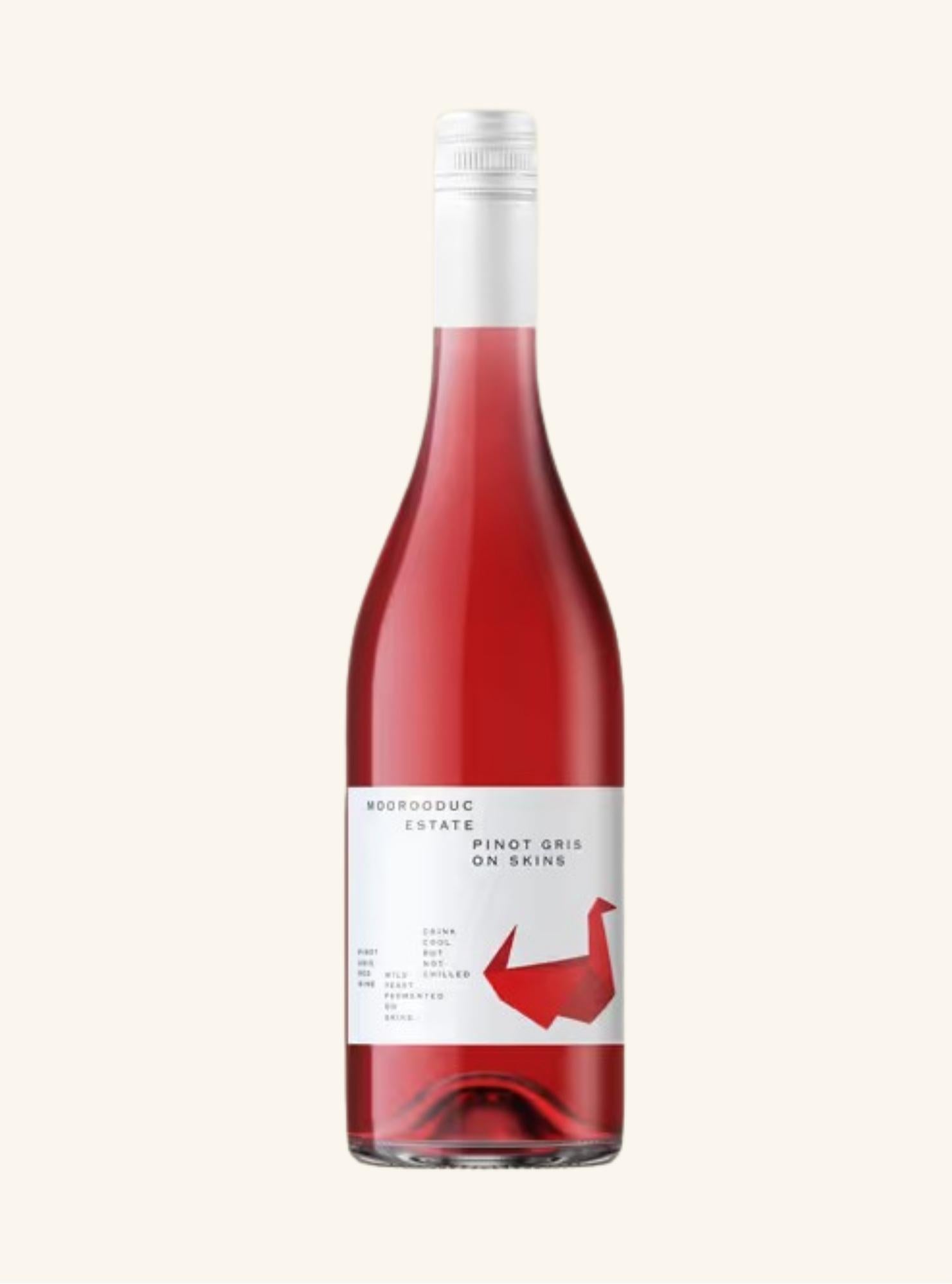 Bottle of light red coloured wine with a white label branded moorooduc estate pinot gris on skins on a white background