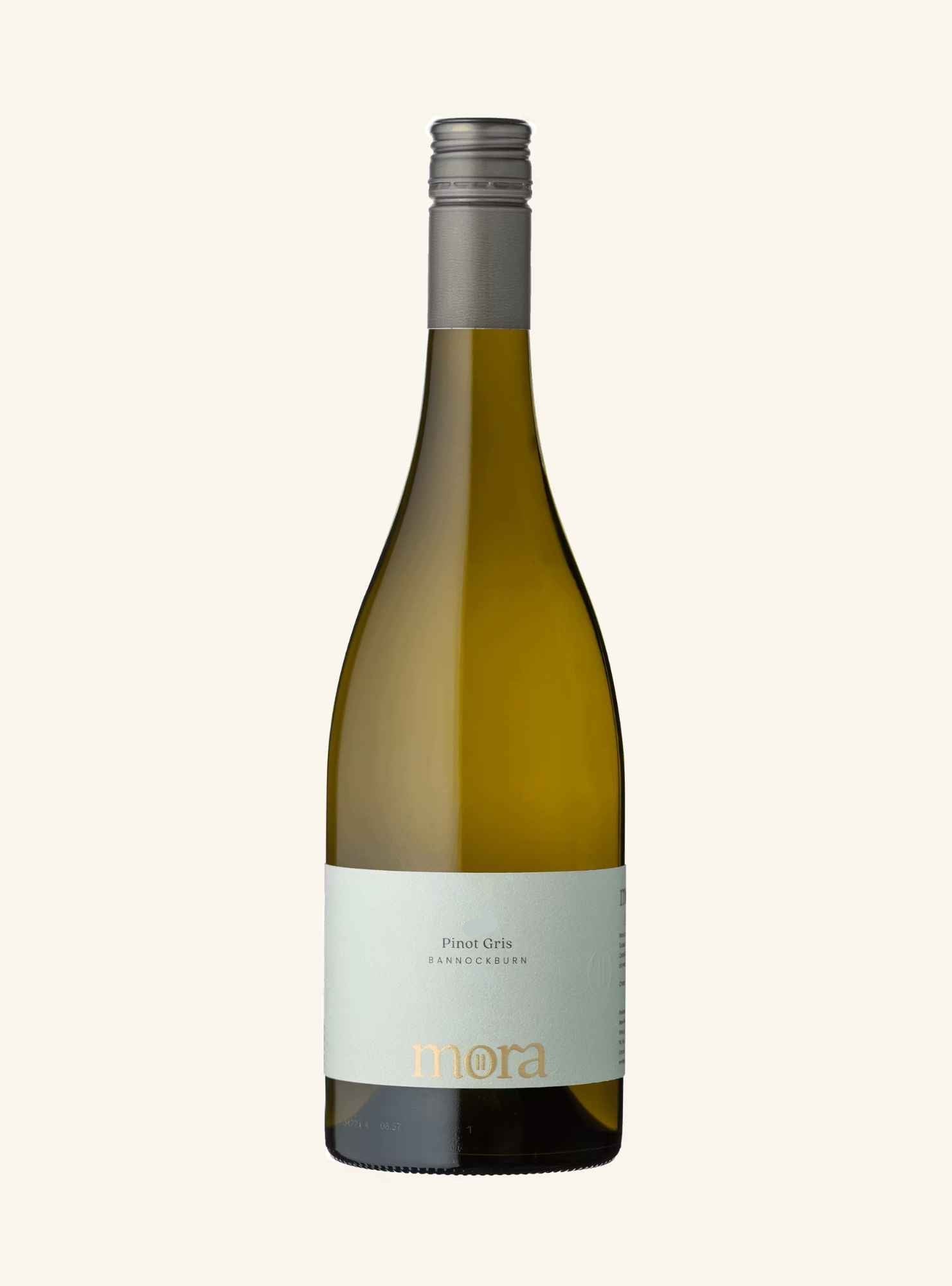 A bottle of Mora Pinot Gris, featuring a pale green glass bottle, a white label with gold lettering, and a silver screw cap, set against a solid off-white background.