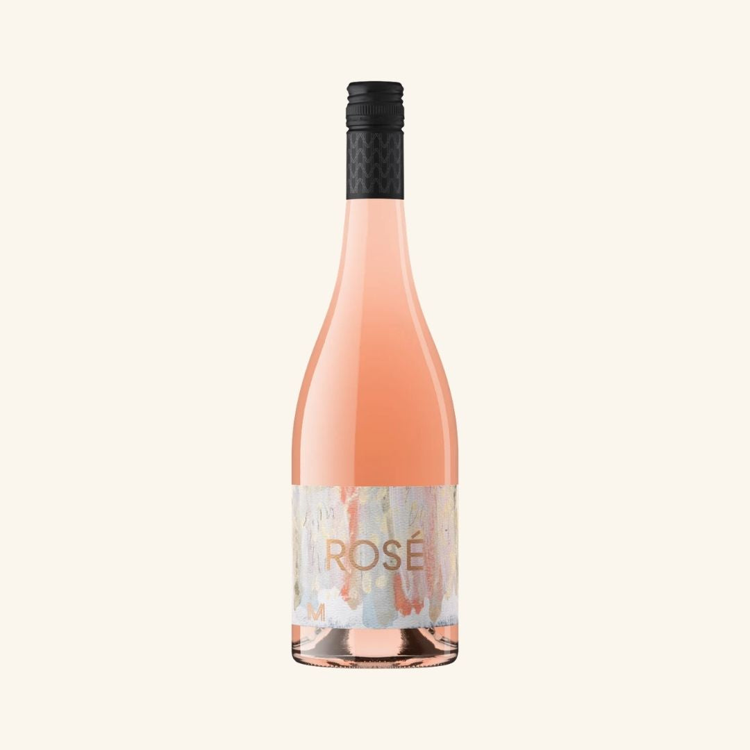 Bottle of rose wine with a black cap, with a colourful label with Rose written across it, all on a white background