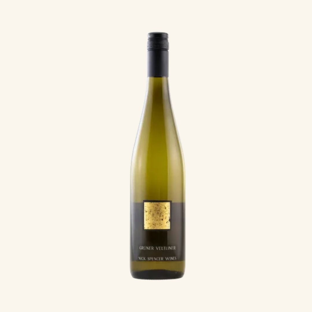 Wine bottle with a visible label branded gruner veltliner nick spencer wines on a white background