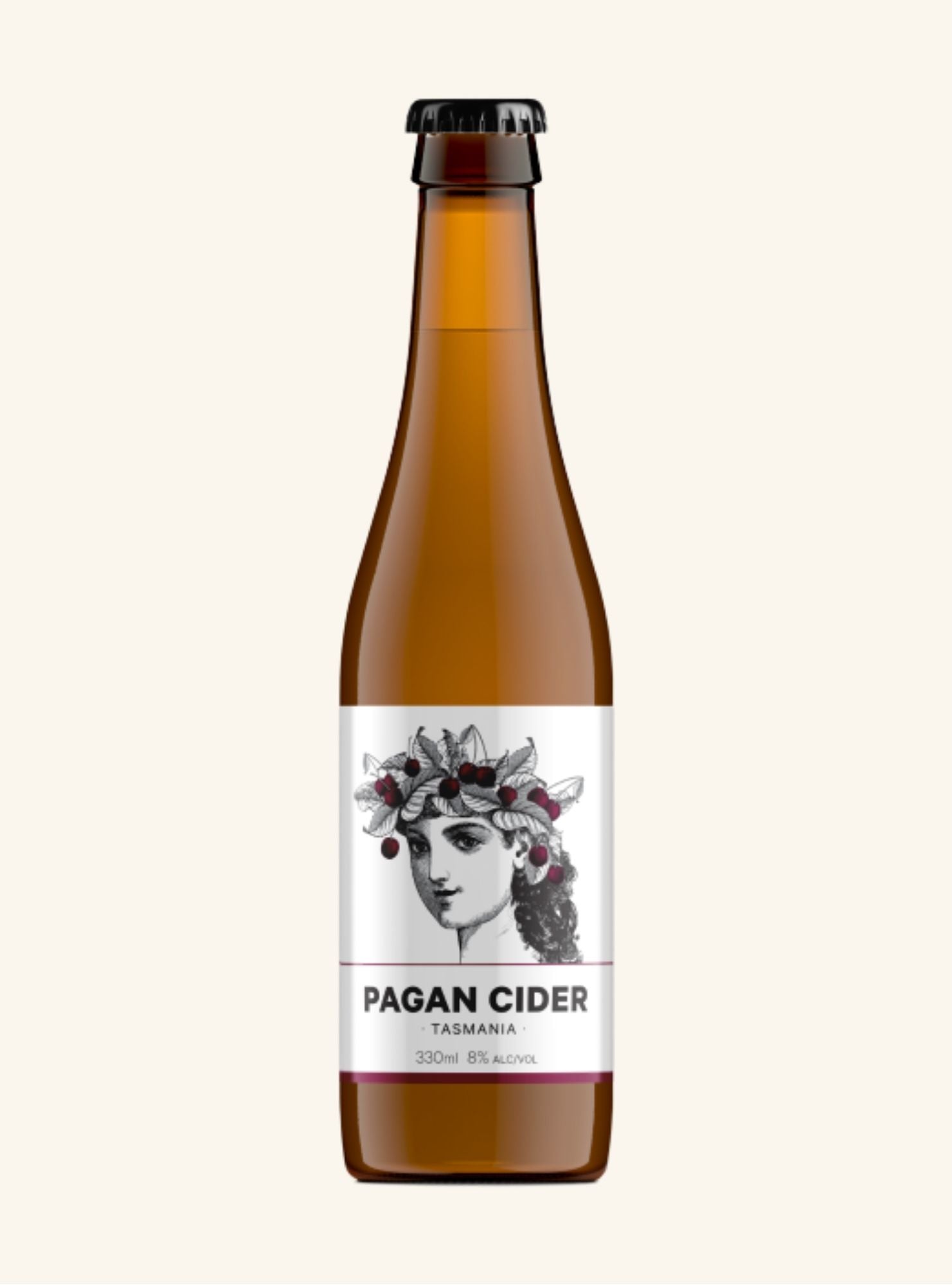 Bottle of Pagan Cider with a label featuring a woman's face on a white background