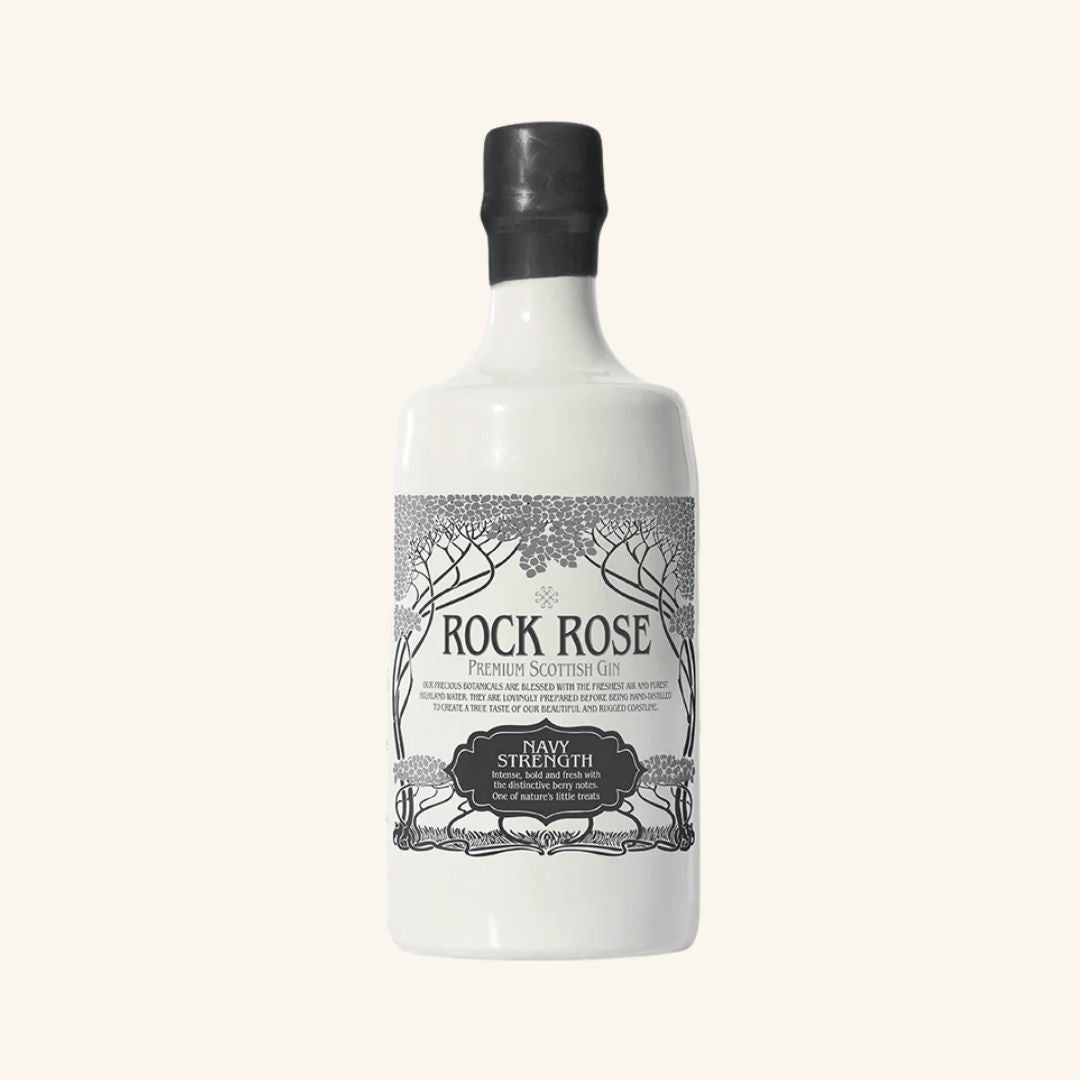 Bottle of scottish Rock Rose navy strength gin on a white background
