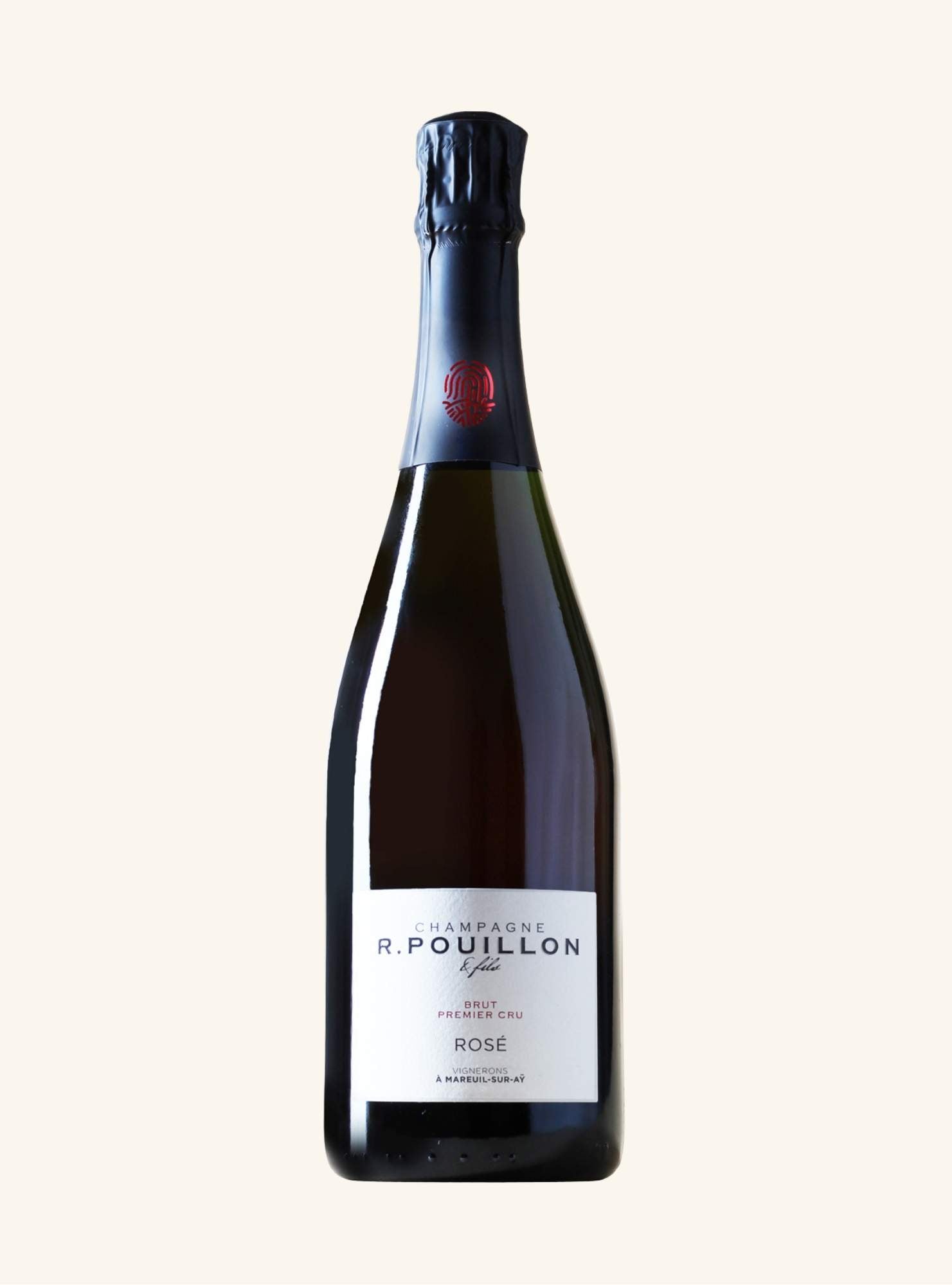Bottle of R. Pouillon Rose champagne on a white background