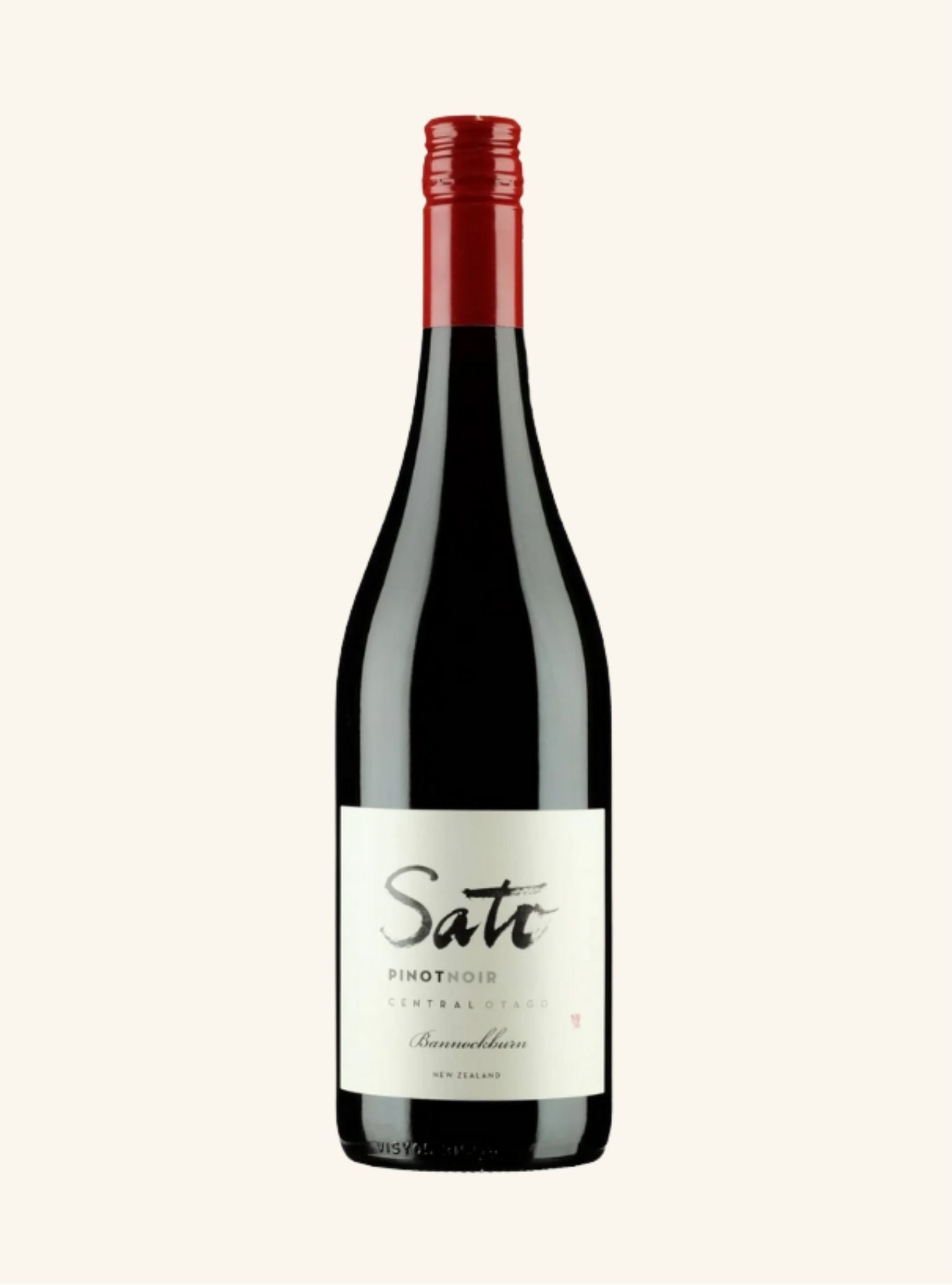 Wine bottle with Sato Bannockburn Pinot Noir written on a white label on a light beige background