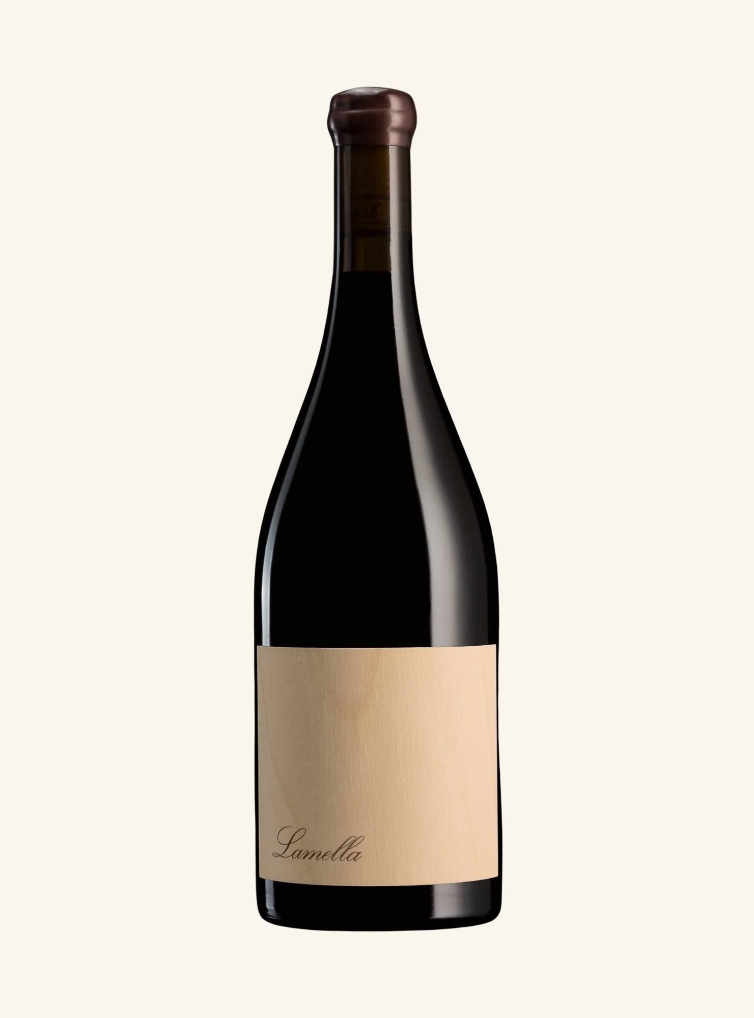 Wine bottle with a beige label branded lamella on a white background