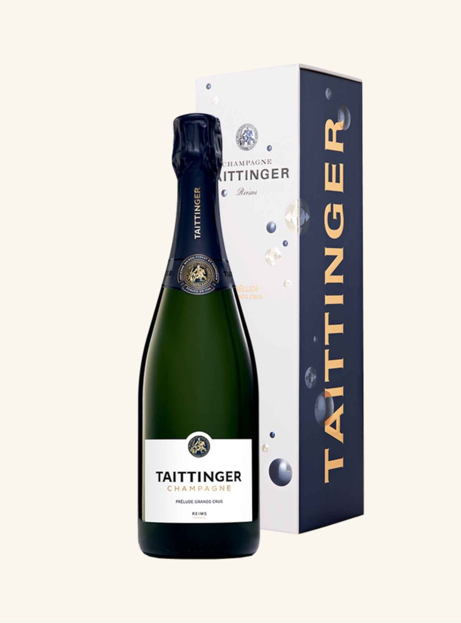 Taittinger prelude grand cru champagne bottle and packaging on a white background