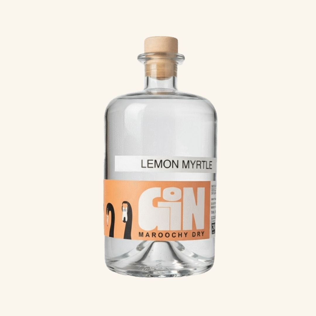 Bottle of Lemon Myrtle Gin maroochy dry with a white label on a light beige background