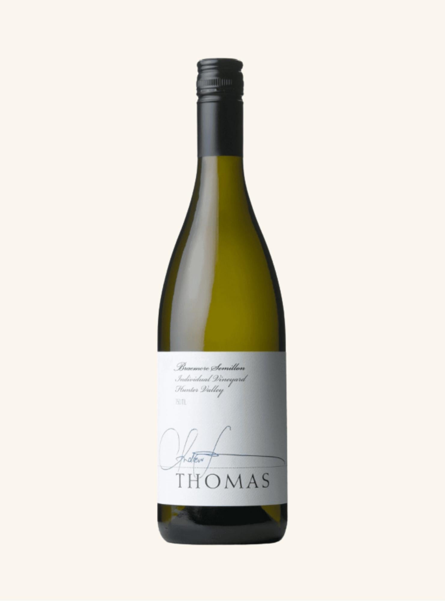 Wine bottle with 'Thomas Braemore Semillon' label on a white background
