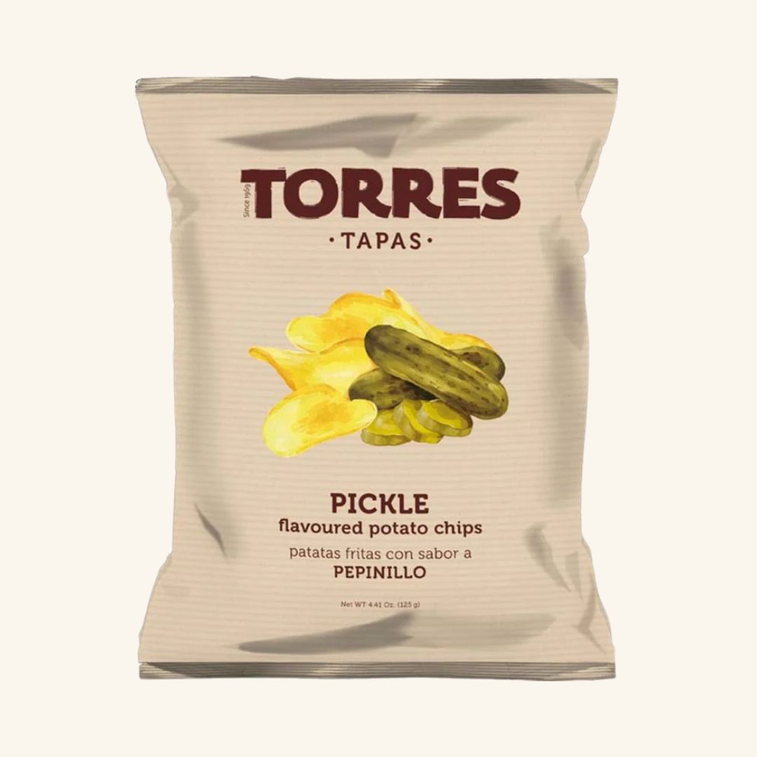 Packaging of Torres Pickle-flavored potato chips on a white background