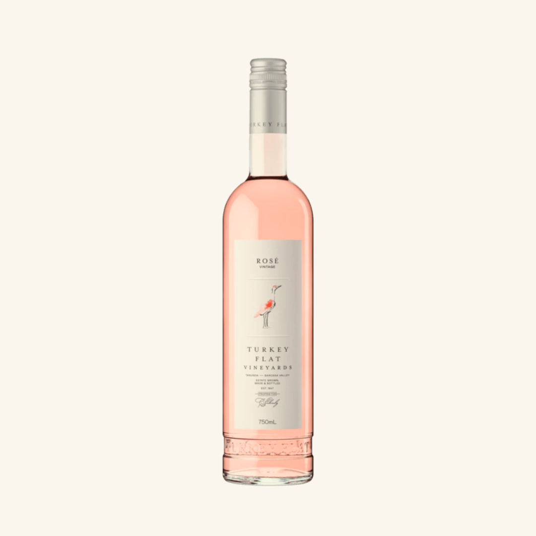 Bottle of Turkey Flat Vineyards Rosé wine with a pink label, indicating it is a dry style wine.