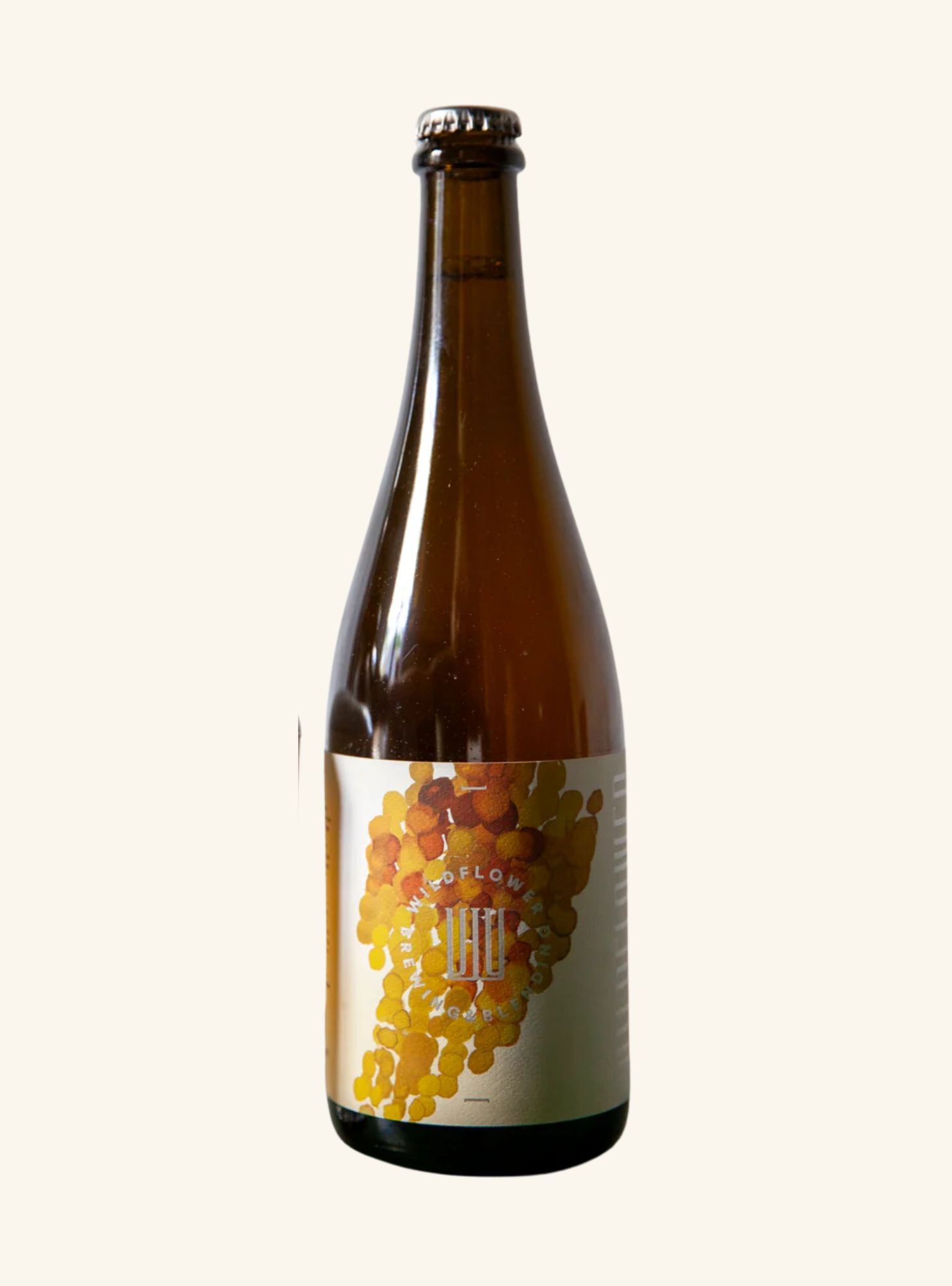 Brown bottle with a label featuring grapes on a white background