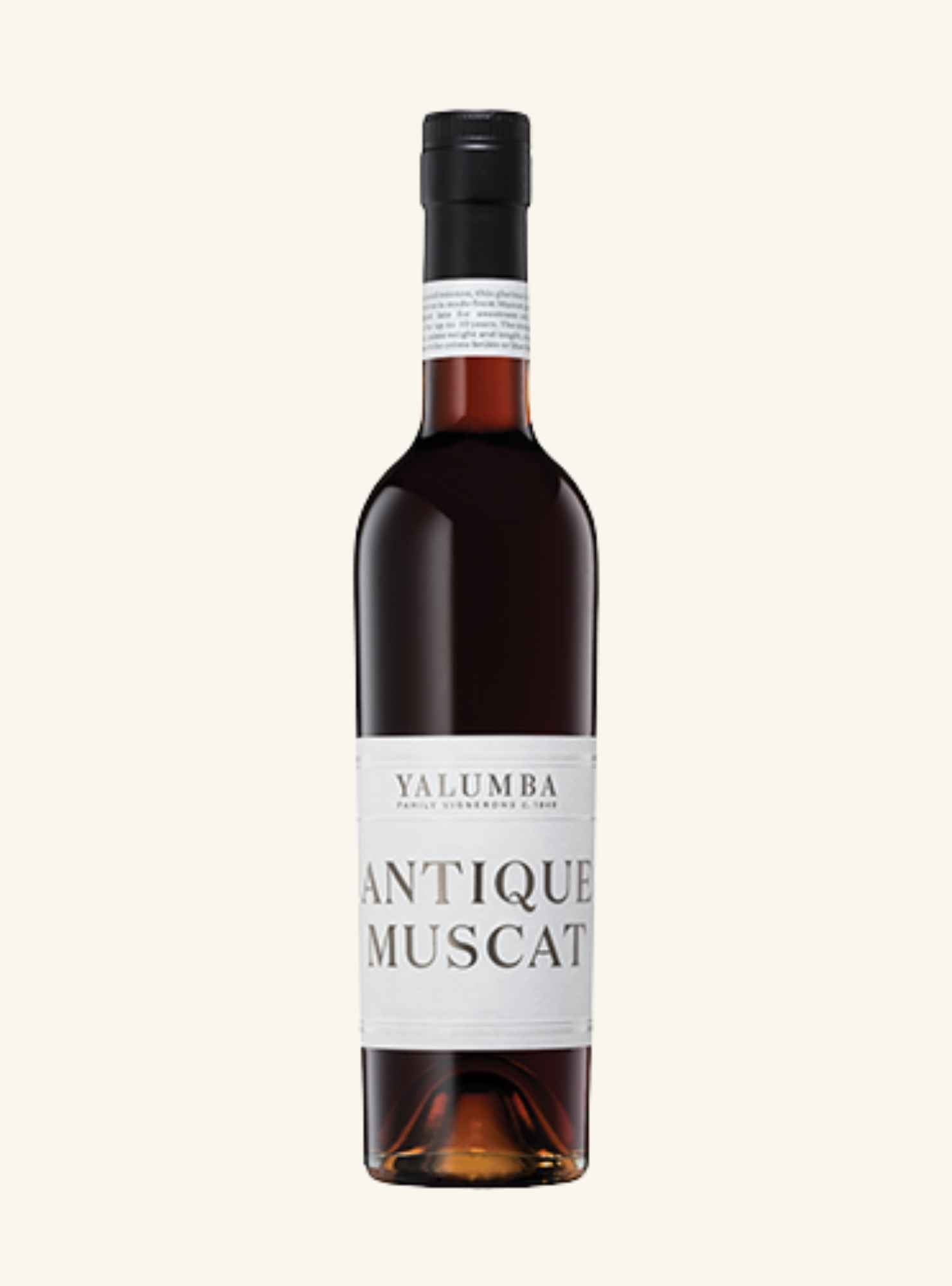 A bottle of Yalumba Antique Muscat white wine, featuring a dark glass bottle with amber-colored wine inside, a black screw cap, and a white label with black text, set against a solid off-white background.