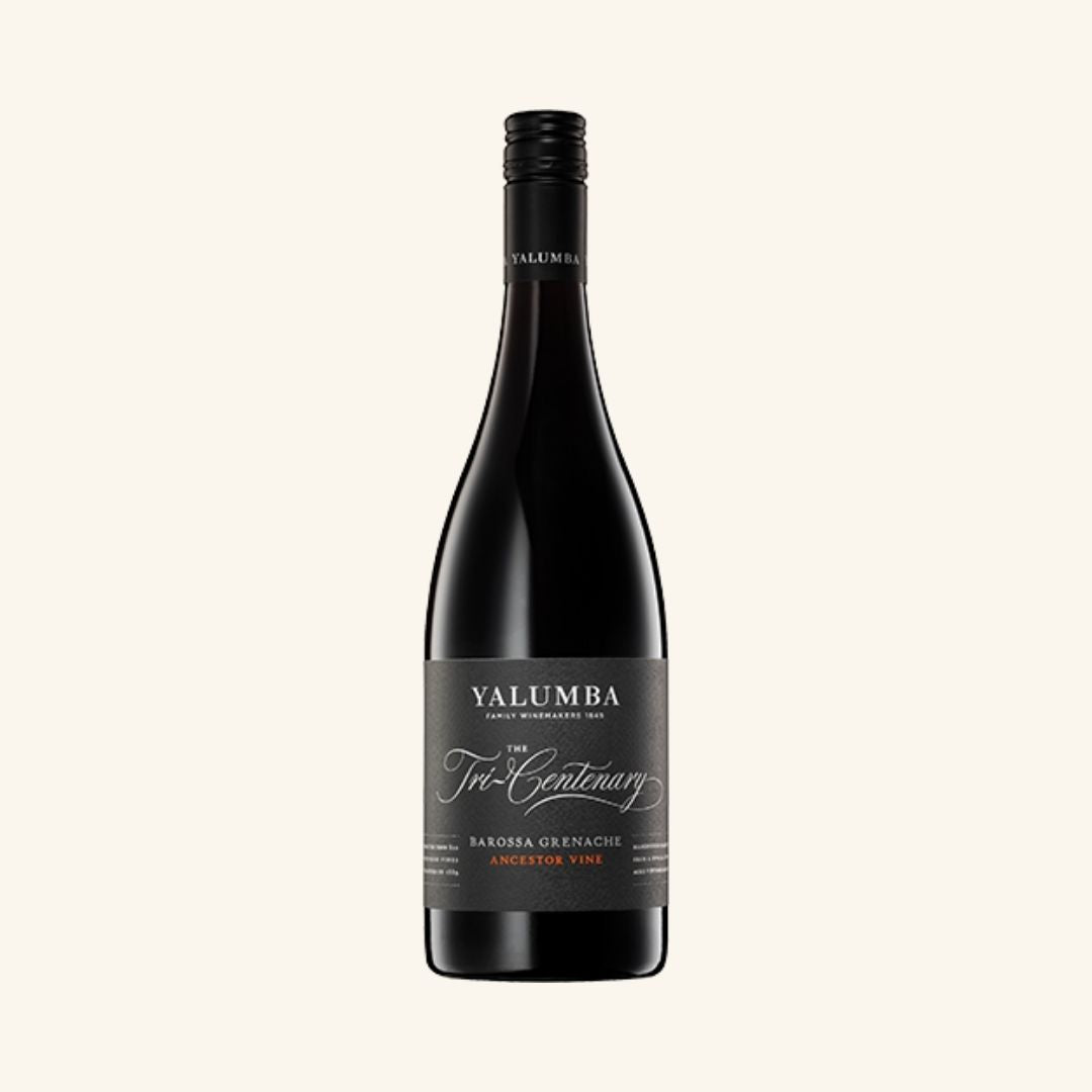 wine bottle branded yalumba the tri centenary grenache on a white background.